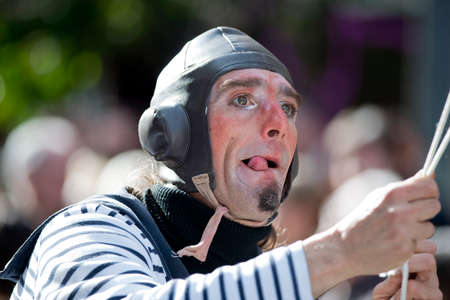 MENTON, FRANCE - 2 MARCH 2014 - Unidentified person masked during the parade of the Lemon Festivaのeditorial素材