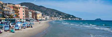 The coastline of Alassio with the village on the sandy beach, in Liguriaのeditorial素材