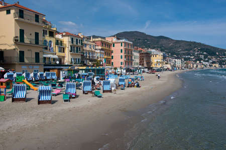 The coastline of Alassio with the village on the sandy beach, in Liguriaのeditorial素材