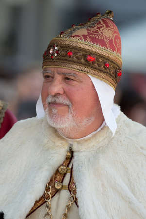 GENOA, ITALY - 8 JUNE  2014 - Unidentified man masked during the historical parade of the Maritime Republics Palioのeditorial素材