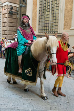 GENOA, ITALY - 8 JUNE  2014 - Unidentified man masked during the historical parade of the Maritime Republics Palioのeditorial素材