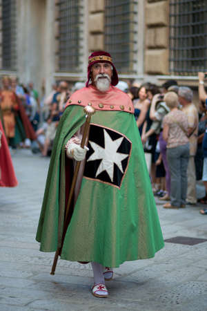 GENOA, ITALY - 8 JUNE  2014 - Unidentified man masked during the historical parade of the Maritime Republics Palioのeditorial素材