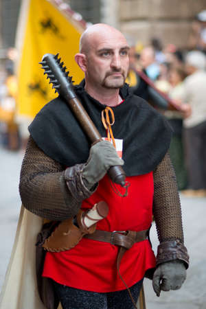 GENOA, ITALY - 8 JUNE  2014 - Unidentified man masked during the historical parade of the Maritime Republics Palioのeditorial素材