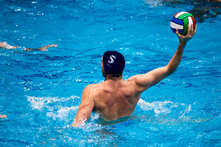 Throw and game action in a swimming pool, during a waterpolo matchのeditorial素材