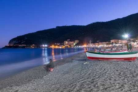 View of the beach of Noli, in the ligurian riviera and its boatsの写真素材