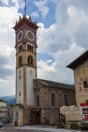 The bell tower of the main church of Cavalese, situated in the Fiemme Valleyの写真素材