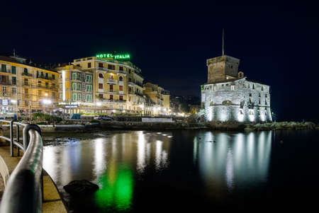 The ancient castle of Rapallo, built on the ligurian sea illuminated by night.のeditorial素材