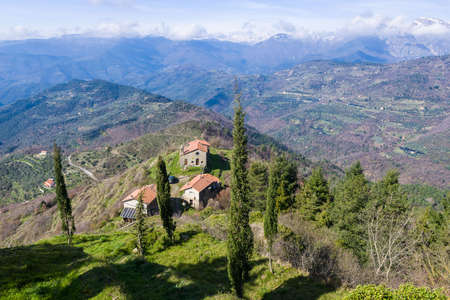 the little church of San Giovanni in the fields near Baiardo, Liguria, Italyの写真素材