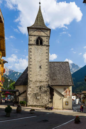 Ancient church in the alpine village of Canazeiのeditorial素材
