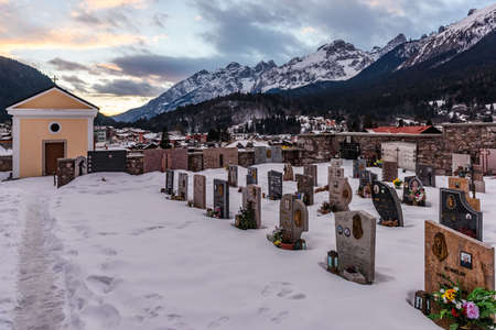 Snowy graveyard in the alpine village of Andalo, Trentinoのeditorial素材