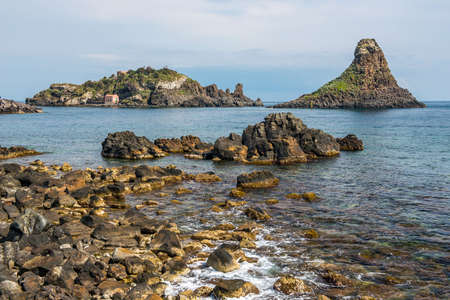 The rocks in front of Aci Trezza, Sicily, called the cyclopean islesの写真素材