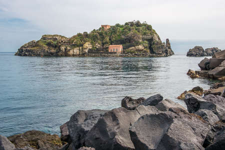 The rocks in front of Aci Trezza, Sicily, called the cyclopean islesの写真素材