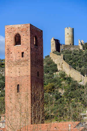 Ancient Tower and Monte Ursino Castle in the old village of Noli on the Italian Rivieraのeditorial素材