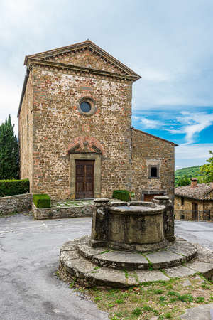 Ancient stone church in the tuscan village of Volpaia, in Chiantiの写真素材