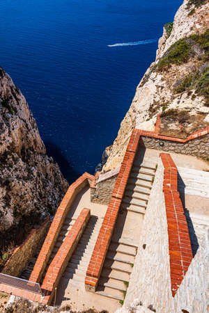 A stairway cut into the cliff in 1954, the 654-step escala del cabirol (goat's steps), leads from a...