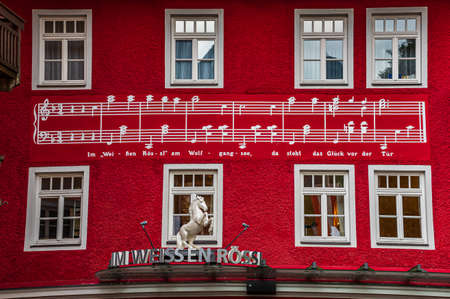 SANKT WOLFGANG, AUSTRIA -  AUGUST 02, 2019 - Score of the operetta The White Horse Inn on the facade of the Hotel in Sankt Wolfgang were was writtenのeditorial素材