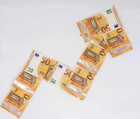50 euro banknote arrow indicating economy rising or strengh of the currency