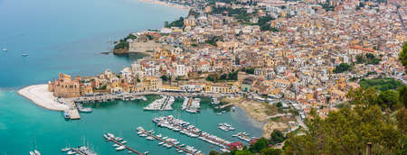View from the top of the hill of the sicilian fishing village of Castellammare del Golfoの写真素材