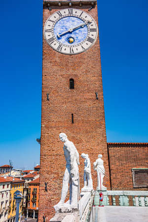 Clock tower of the Basilica Palladiana, a Renaissance building (an Unesco World Heritage Site) in the central Piazza dei Signori in Vicenzaのeditorial素材