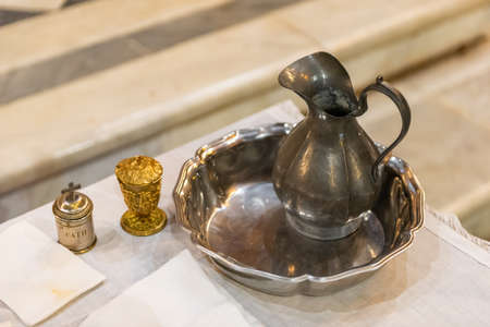 Ampoule with water and oil for the catholic baptismの写真素材
