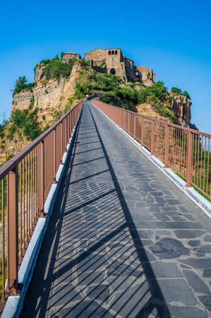 The ancient village of Civita di Bagnoregio, also called the diying city, in the region of Tuscia, Italyの写真素材