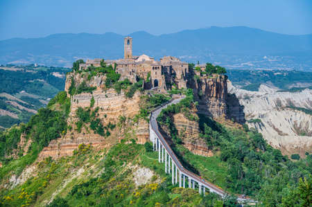 The ancient village of Civita di Bagnoregio, also called the diying city, in the region of Tuscia, Italyの写真素材