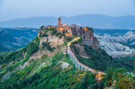 The ancient village of Civita di Bagnoregio, also called the diying city, in the region of Tuscia, Italyの写真素材