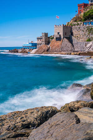 Beach, cliff and fishing village of Vernazzola near the center of Genoa, on the italian Rivieraの写真素材
