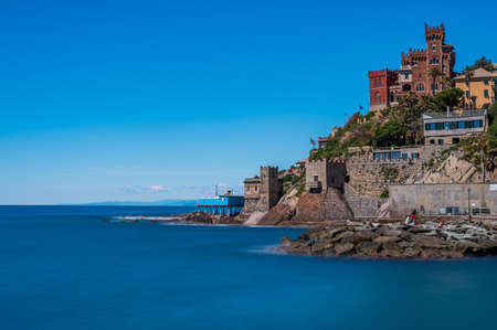 Beach, cliff and fishing village of Vernazzola near the center of Genoa, on the italian Rivieraの写真素材