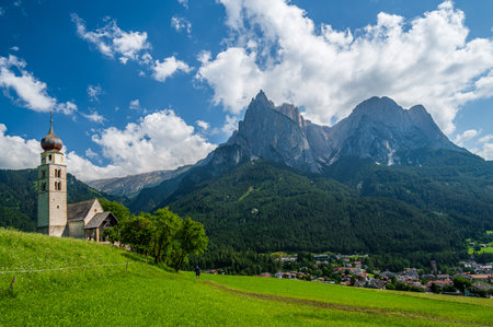 Church of San in the mountain village of Kastelruth in the heart of Dolomitesの写真素材