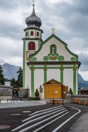 church in the mountain village of San Cassiano, Val Badia, in the heart of Dolomitesの写真素材