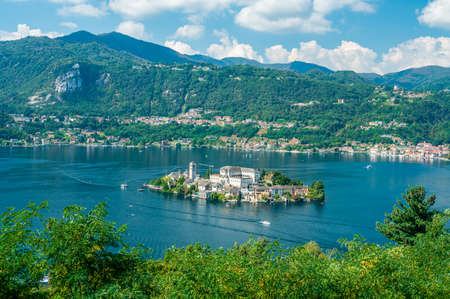San Giulio Island is an island within Lake Orta in Piedmont with a benedictine Monasteryの写真素材