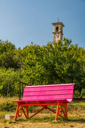 Lilac and Orange Big Bench in Monastero Vasco, little village of Piedmontの写真素材