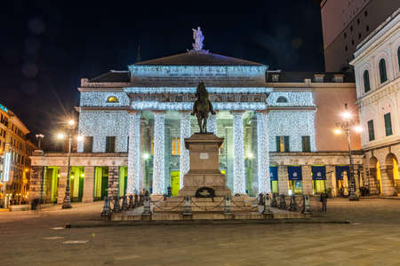 Statue of Garibaldi facing Theater Carlo Felice in the old town of Genoa, illuminated by Christmas decorationsのeditorial素材