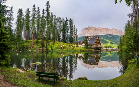 Little alpine lake dla le, near La Villa in the Dolomites of Val Badia, facing Sas dla Cruscのeditorial素材