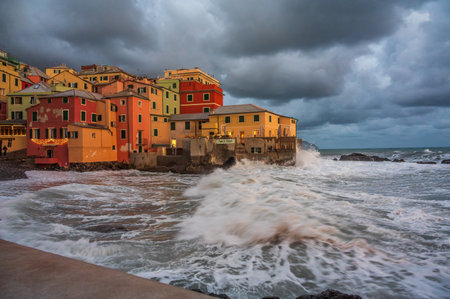 The stormy sea at the fishing village of Boccadasse, in the center of Genoa, Italyの写真素材