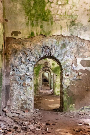 The ruins of big fortress called Forte Monte Ratti at the top of a hills of Genoa, Italyの写真素材