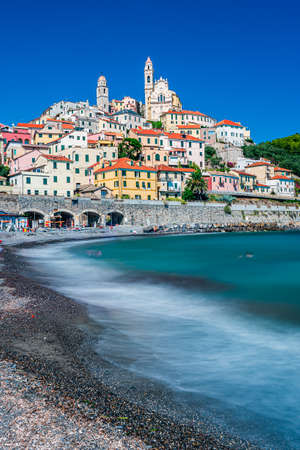 The ancient village of Cervo on a hill facing the sea, on the Italian Rivieraの写真素材