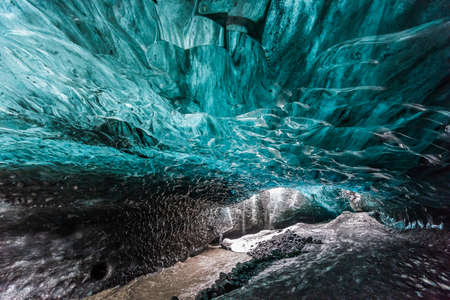 The wonderful colors of blue ice in the ice caves of Vatnajokull, Europe's largest glacierの写真素材