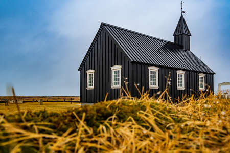 The little black church of Budir in the south part of Snaefellsnes Peninsula, Icelandの写真素材