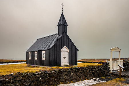 The little black church of Budir in the south part of Snaefellsnes Peninsula, Icelandの写真素材