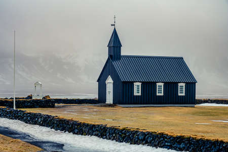 The little black church of Budir in the south part of Snaefellsnes Peninsula, Icelandの写真素材