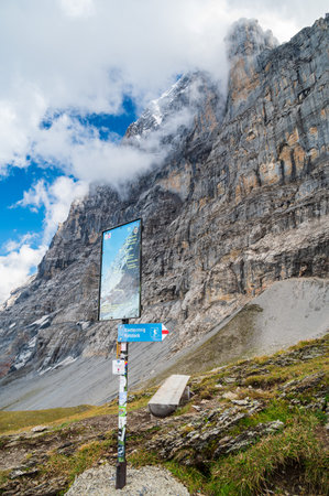 Sign on the Eiger Trail, under the North Side of the Mountainの写真素材