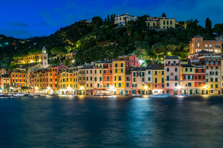 View of the old town of Portofino, illuminated at dusk, world famous ancient maritime village in the Italian Rivieraの写真素材