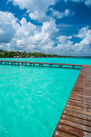 Pier over the wonderful turquoise water in the Bacalar Lagoon, Mexicoの写真素材