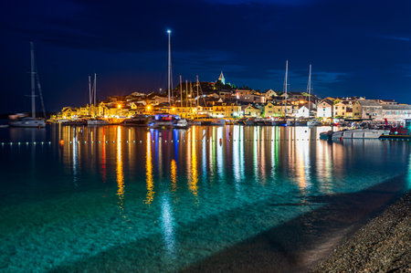 View of the old town of Primosten an ancient fishing village on the Croatian Coast near Sibenik at duskの写真素材