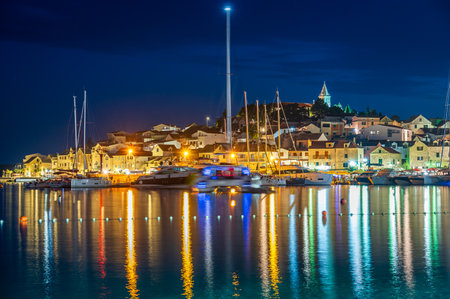 View of the old town of Primosten an ancient fishing village on the Croatian Coast near Sibenik at duskの写真素材
