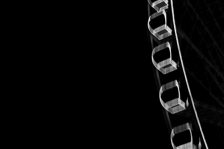 Ferris roller wheel at market is a landmark place near Mekhong river . black and white light basket on the sky . Motion blur or low light abstract , Bangkok Thailandの写真素材