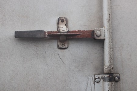 Rivet lock doors rust old .の写真素材