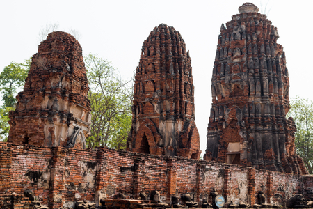 Ancient stupa , pagoda in archaeological site at Wat Mahathat temple .の写真素材